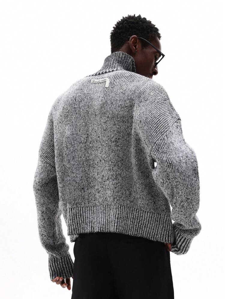 Maglione a collo alto in maglia grossa mélange