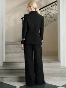 Anewsta بدلة نسائية مكونة من: بليزر نسائي طويل الأكمام مزين بأشرطة الكشكشة والرينستون والمشبك المعدني غير متماثل، مع بنطال نسائي عالي الخصر مطوي، مجموعة بدلة نسائية عصرية فاخرة - الأسود - مشاهدة 2