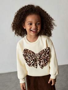 Maija Kids بلوزة كاجوال بياقة مستديرة مزينة بفيونكة بطبعة نمر للبنات الصغيرات