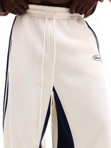 SUMWON 低裆运动裤，侧边拼接撞色设计，饰有赛车条纹，休闲慢跑裤