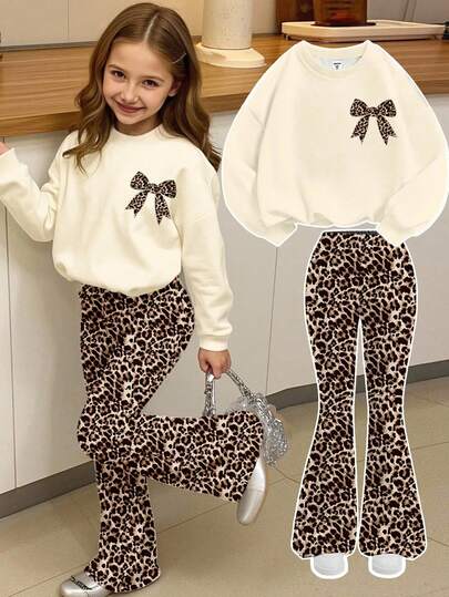 SHEIN Happikins Vintage Sweet Leopard Bow Print Cream White Tracksuit, Casual Loose Fit Crew Neck Long Sleeve Sweatshirt And Pants 2 Pieces Set, Suitable For Autumn/Winter, Cozy Season, Christmas Vibes, Christmas Gifts, Autumn & Winter Outfits For Outing, Easy Comfort, Autumn & Winter Layers For Baby & Young Girl, Stylish Young Girl, Casual Wear, Baby & Kids Graphic Tops, New Style, Fall New Style, Winter Fashion