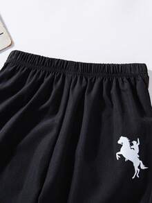 SHEIN Explorewe Pantalones con estampado de rayas asimétrico versátil y combinable para niños preadolescentes