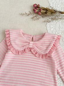 SHEIN 2pcs Baby Girls' Autumn/Winter Outfit, Sweet Princess Style Pink & White Striped Set, Essential For Outings & Family Gatherings, Made Of Waffle Knit Fabric; Top With Ruffled Collar & 3D Bow Accent, Striped Pattern Is Fresh & Cute; Bottom With Bell-Bottom Pants & Ruffled Hem