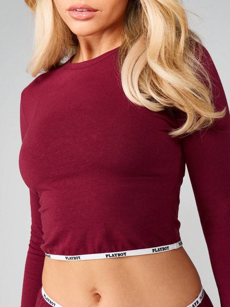 Missguided x Playboy Long Sleeve Fitted Crop Top With Logo Waistband Detail