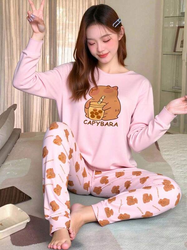 Süßer, niedlicher, eleganter, lässiger und bequemer täglicher Pyjama-Set für Teenager-Mädchen in Rosa mit Capybara-Cartoon-Graffiti-Muster. Bestehend aus Crew-Neck-Oberteil mit Strickstoff und eng anliegender Lange Ärmel sowie Hose, 2-teilig.