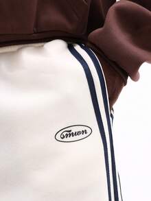 SUMWON 低裆运动裤，侧边拼接撞色设计，饰有赛车条纹，休闲慢跑裤