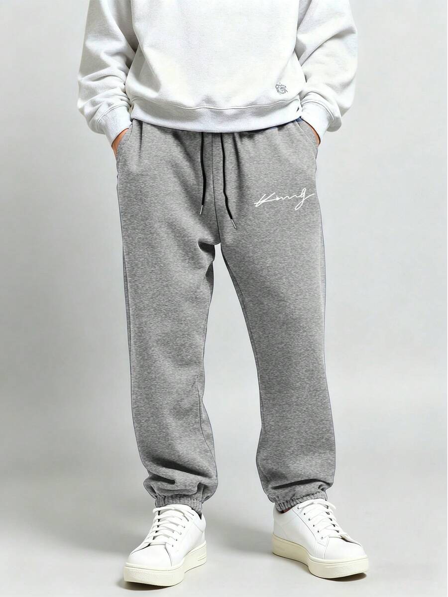 Manfinity Homme Pantalones de chándal casuales de unicolor con cordón en la cintura para hombres - Gris Claro - Ver 1