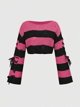 Top de punto corta con cordones laterales a rayas naranja y negro de Halloween