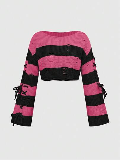 Top de punto corta con cordones laterales a rayas naranja y negro de Halloween