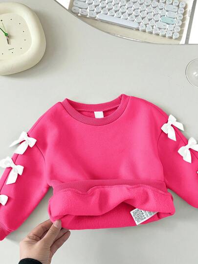 SHEIN Sudadera de manga larga con lazo beige, versátil y linda para bebé niña, otoño/invierno