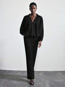 Maija Chaqueta con mangas de murciélago, cuello en V profundo metálico y bajo con volantes, nueva para mujer Otoño/Invierno 2025. Apta para oficina, salidas, uniforme de profesora, atuendo de club, y casual de negocios de mujer en Otoño/Invierno.