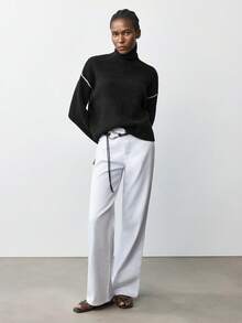 Maija Luźny sweter z blokami kolorów i artystycznym wzorem linii dla kobiet w 2025 roku