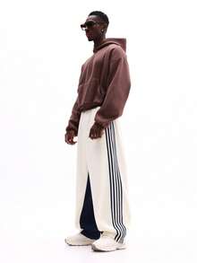 SUMWON 低裆运动裤，侧边拼接撞色设计，饰有赛车条纹，休闲慢跑裤