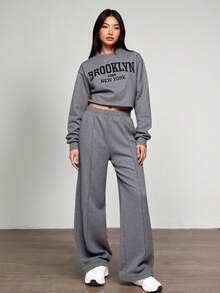 Sparklyn 2 件套青少年女孩休闲宽松花卉印花短款宽松运动衫 + 松紧腰阔腿裤套装，百搭杏色 - 灰色 - 查看 5