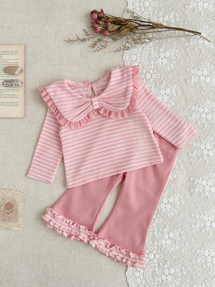 SHEIN 2pcs Baby Girls' Autumn/Winter Outfit, Sweet Princess Style Pink & White Striped Set, Essential For Outings & Family Gatherings, Made Of Waffle Knit Fabric; Top With Ruffled Collar & 3D Bow Accent, Striped Pattern Is Fresh & Cute; Bottom With Bell-Bottom Pants & Ruffled Hem
