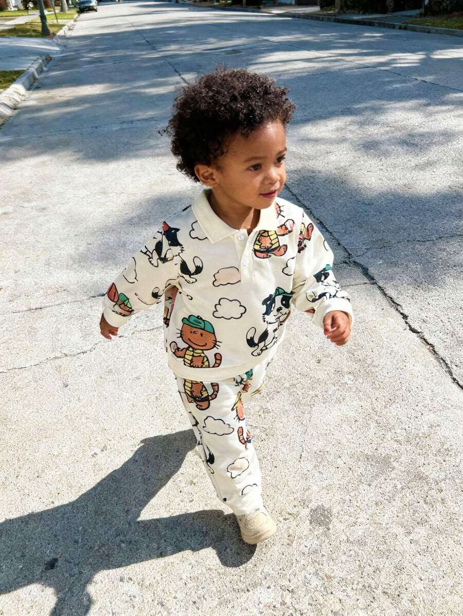 SHEIN 2pcs Young Boys Toddler Infant Kids Cute Casual Cream White All Over Cartoon Animal Cat Dog Playing Baseball Print Graphic Long Sleeve Turn Down Collar Button Polo Shirt Sweatshirt Tops And Elastic Waist Sweatpants Joggers Pants Two Piece Outfit Sets Thick Soft Clothes For Daily Wear School Fall Autumn Winter - Light Grey - View 1