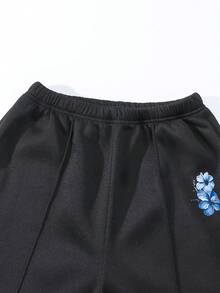 适合13-16岁少女的秋冬两件套，印花圆领卫衣搭配时尚可爱的日常休闲运动裤，适合上学、度假、旅行、户外运动和返校穿着。 - 黑色 - 查看 6