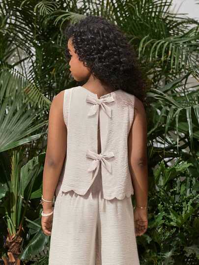 SHEIN 青少年女孩休闲度假简约蝴蝶结后背装饰花瓣贝壳下摆无袖衬衫上衣，纯色