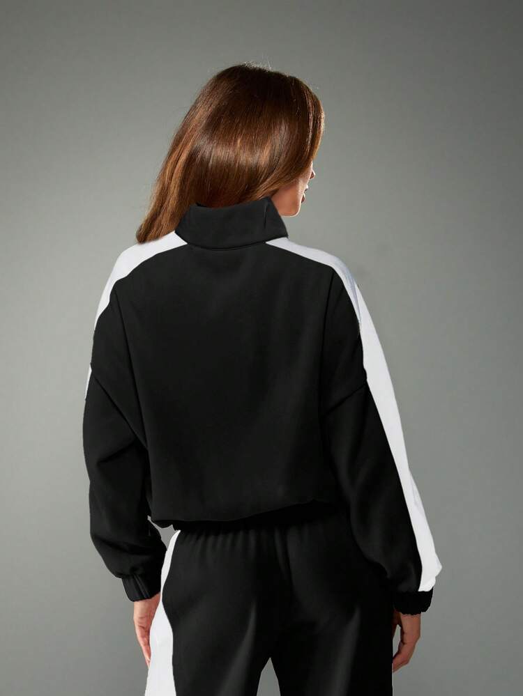 MISSGUIDED Oversized Half Zip Pullover Sweatshirt With Contrast Side Stripes And Logo