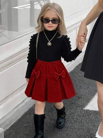 Elladie kids Set de 2 piezas de ropa casual para niñas: Blusa de manga larga abullonada en negro + Falda de pana caqui con lazo, estilo retro lindo, ajuste cómodo, adecuado para uso diario, viajes, escuela, fiestas