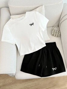 Resyla 大码女式休闲蝴蝶结印花T恤和松紧腰短裤套装，适合春夏穿着，适合户外运动，是送给女士、姐妹、妈妈、母亲节的理想礼物。 - 彩色 - 查看 1