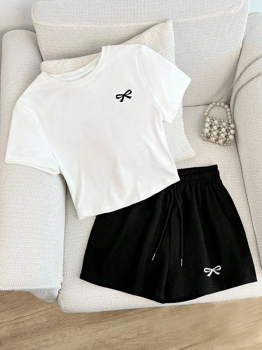 Resyla 大码女式休闲蝴蝶结印花T恤和松紧腰短裤套装，适合春夏穿着，适合户外运动，是送给女士、姐妹、妈妈、母亲节的理想礼物。 - 彩色 - 查看 1