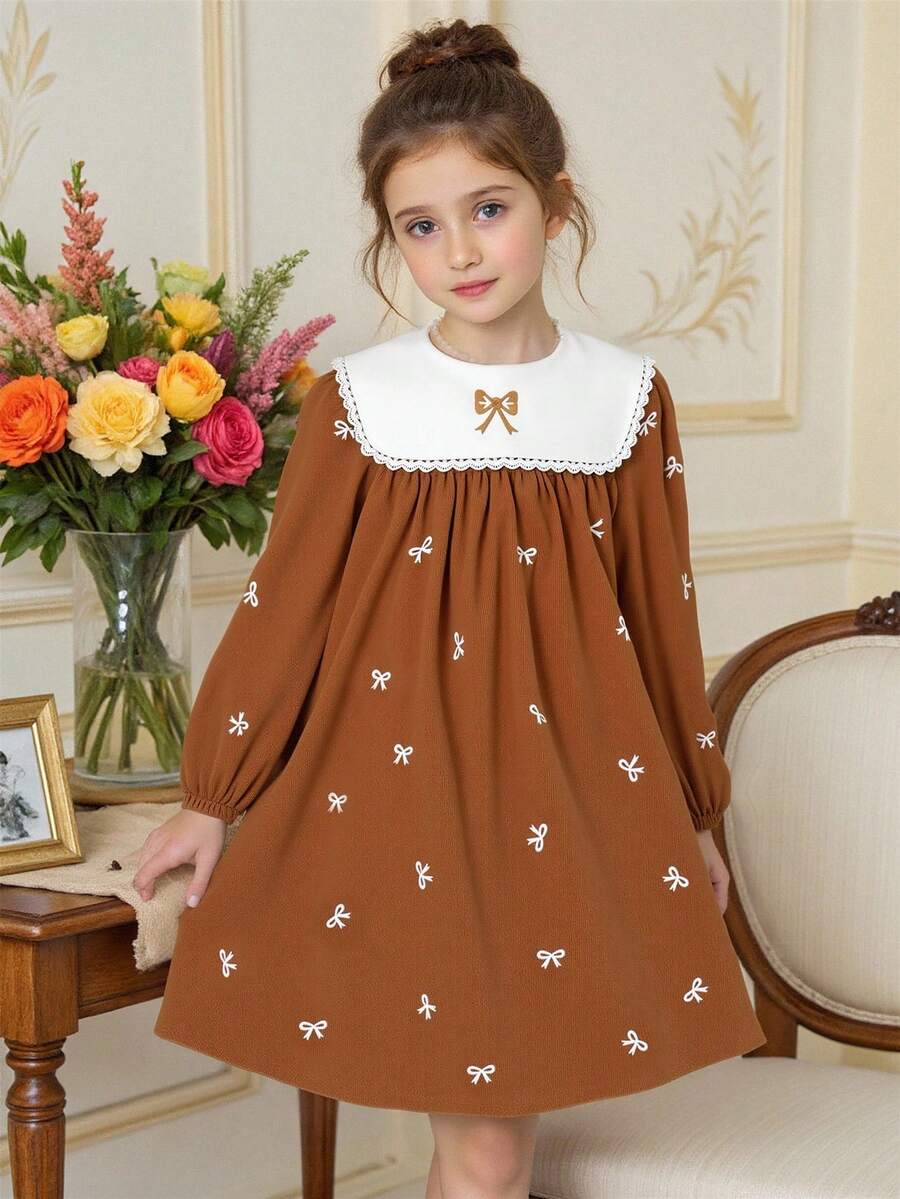 Souflis Souflis Vestido a juego familiar de otoño para niñas jóvenes, dulce vestido de pana con cuello azul marino, lazo bordado, volantes, mangas abullonadas, corte holgado, lindo y de moda para invierno - Marrón - Ver 1