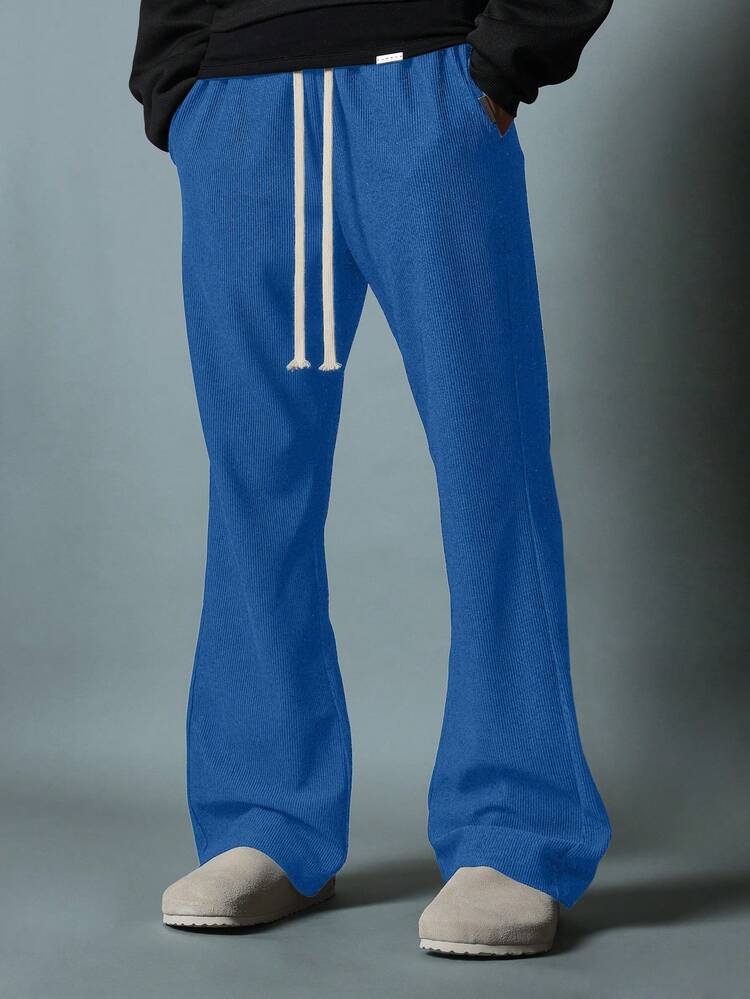 Pantalon côtelé texturé coupe évasée avec cordon de serrage