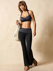 VARSIVA Women's Color-Blocked Polka Dot Print Backless Halter Neck Top With Built-In Bra Pads And Polka Dot Flared Pants With Folded Waistband, Casual Sportswear Set. - Black and White - View 1
