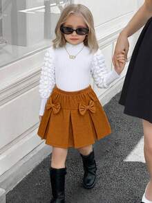 Elladie kids Set de 2 piezas de ropa casual para niñas: Blusa de manga larga con mangas abullonadas en negro + Falda de pana caqui con lazo, estilo dulce y retro, cómodo para uso diario, viajes, escuela, fiestas - Multicolor - Ver 1