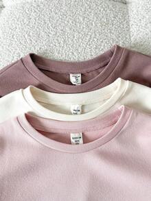 SHEIN 6件套少女秋冬连体衣套装，包括圆领长袖上衣、字母装饰的九分袖长裤、柔软亲肤的保暖内衣，以及一套包含长袖上衣和打底裤的睡衣套装。 - 彩色 - 查看 3