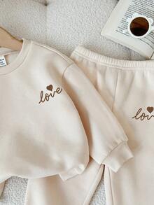 SHEIN Babygirl Cute Apricot Bow Decor Long Sleeve Sweatshirt & Elastic Waist Pants Set, Autumn/Winter Baby Set Autumn Winter Season Neutral Baby Clothes Cream Baby Girl Outfit Baby Girl Sweat Set Baby Casual Sets - Apricot - View 5