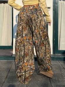 Muchica Spodnie damskie z rozkloszowanym splotem i nadrukiem gałęzi - Wielokolorowe - Zobacz 2