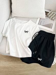 Resyla 大码女式休闲蝴蝶结印花T恤和松紧腰短裤套装，适合春夏穿着，适合户外运动，是送给女士、姐妹、妈妈、母亲节的理想礼物。 - 彩色 - 查看 3