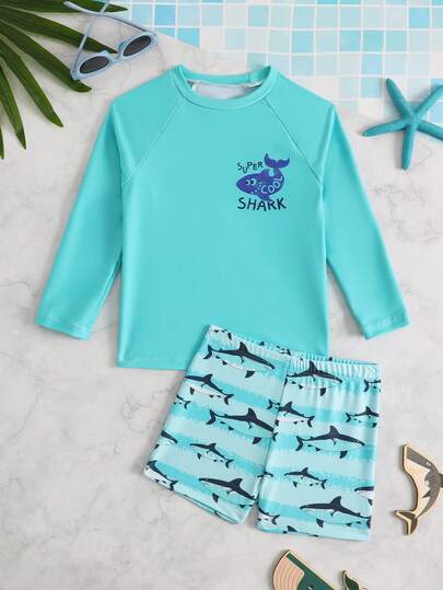 SHEIN Set de 2 piezas de ropa de baño casual de moda para niños, pantalones de baño a rayas + parte superior de unicolor, adecuado para nadar, vacaciones en la playa