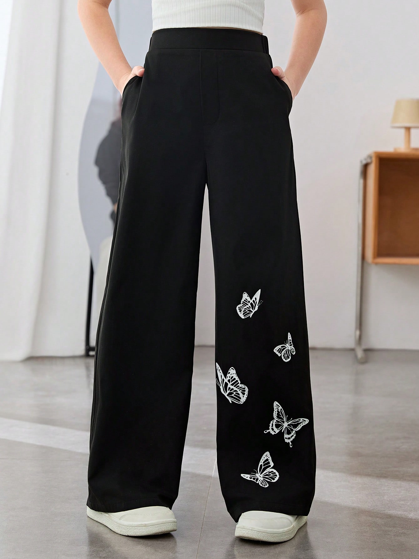 SHEIN بنطلون أسود فضفاض بقصة ساق واسعة مع طباعة وض...