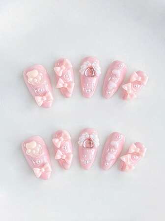 Kawaii 10 pezzi di unghie finte stile carino con elementi a forma di arco, zampa di gatto e ali, + 3 pezzi di nastro biadesivo, stile Y2K, dipinte a mano in colore rosa tinta unita, a forma di mandorla, rimovibili, adatte per feste, balli e uso quotidiano