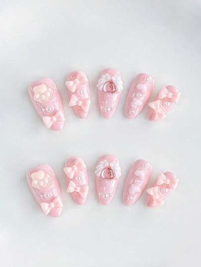 Kawaii 10 Pieces Of Cute Style Bow Love Cat Claw Wing Element Fake Nails + 3 Pieces Of Double-Sided Tape, V2K Style Hand-Painted Pink Solid Color Removable Medium Almond-Shaped Crossing Armor, Suitable For Parties, Dances And Daily Wear,