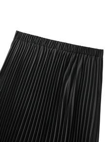 GlowEve CURVE 大码梭织面料女式半身裙，松紧腰设计，金属扣装饰，A字褶裥不对称裙摆，优雅百搭，适合秋冬季通勤、工作及休闲场合穿着。 - 黑色 - 查看 4