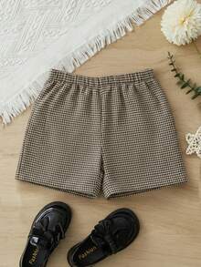 SHEIN 年轻女孩时尚优雅格子金色金属装饰纽扣前开短裤，学院风，非常适合秋冬季休闲日常穿着和上学穿着，母女姐妹装。 - 卡其色 - 查看 4