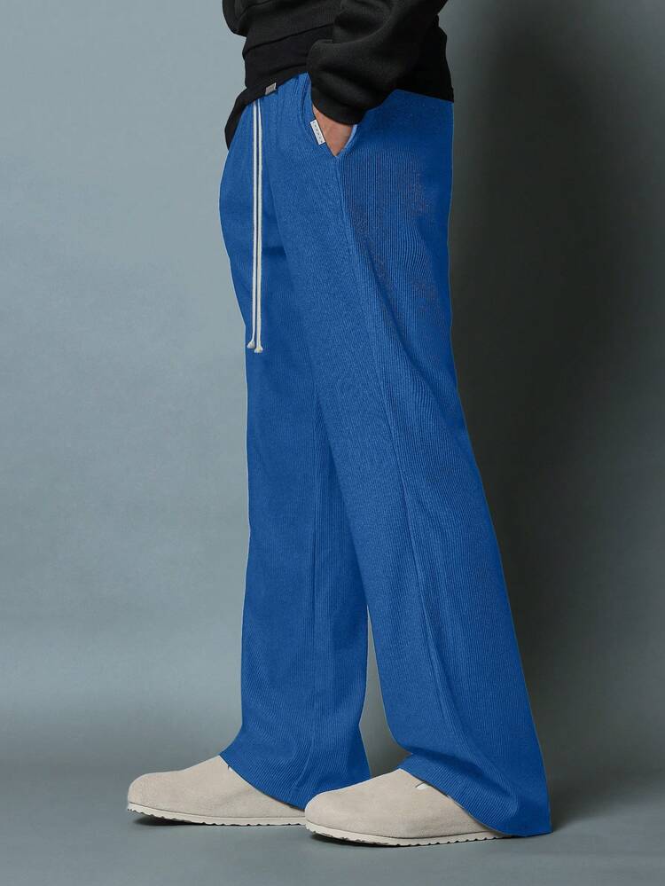 Pantalon côtelé texturé coupe évasée avec cordon de serrage