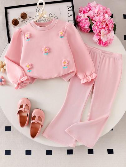 Bộ 2 món gồm áo nỉ và quần ống loe màu hồng dệt kim cho bé gái, bộ đồ thường ngày dễ thương tay phồng họa tiết hoa cho mùa xuân/thu.