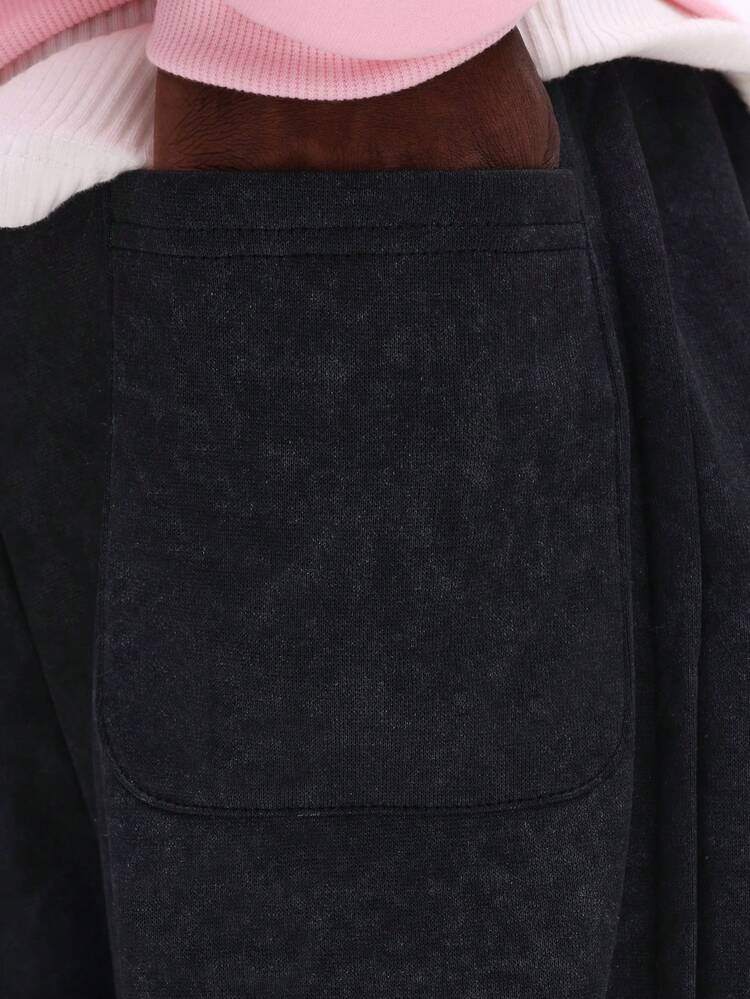 사이드 포켓이 있는 편안한 드로스트링 스웨트팬츠