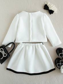 SHEIN 2pcs Baby Girl Cute Sweet Elegant Preppy Fashion White Black Contrast Color Binding Trim Bow Knot Decor Long Sleeve Round Neck Cardigan Jacket Blazer Coat Tops And A-Line Skirt Two Pieces Outfit Sets Suit Soft Clothes For Party Birthday Wedding Photo Shoot Fall Autumn Winter - White - View 2