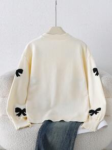 Tween Girls' Premium Autumn Winter New Style Apricot Knit Cardigan- Long-Sleeve Outerwear With Exquisite Jacquard Bow Pattern, Detachable 3D Bow Decoration, Ultra-Soft Cozy Fabric, Loose Lazy Silhouette, Elegant & Versatile, Easy To Match With Tees/Dresses, Suitable For Daily Life & Festive Atmospheres Bow Clothes Sweater With Bows Bow Cardigan Bows Shirt Bow Clothes For Girls Girls Cardigan For Dress Kids Sweaters For Girls Button Girl S Spring And Autumn Suit Simple Dresses For Girls Long Sleeve With Split Jacket - Apricot - View 2