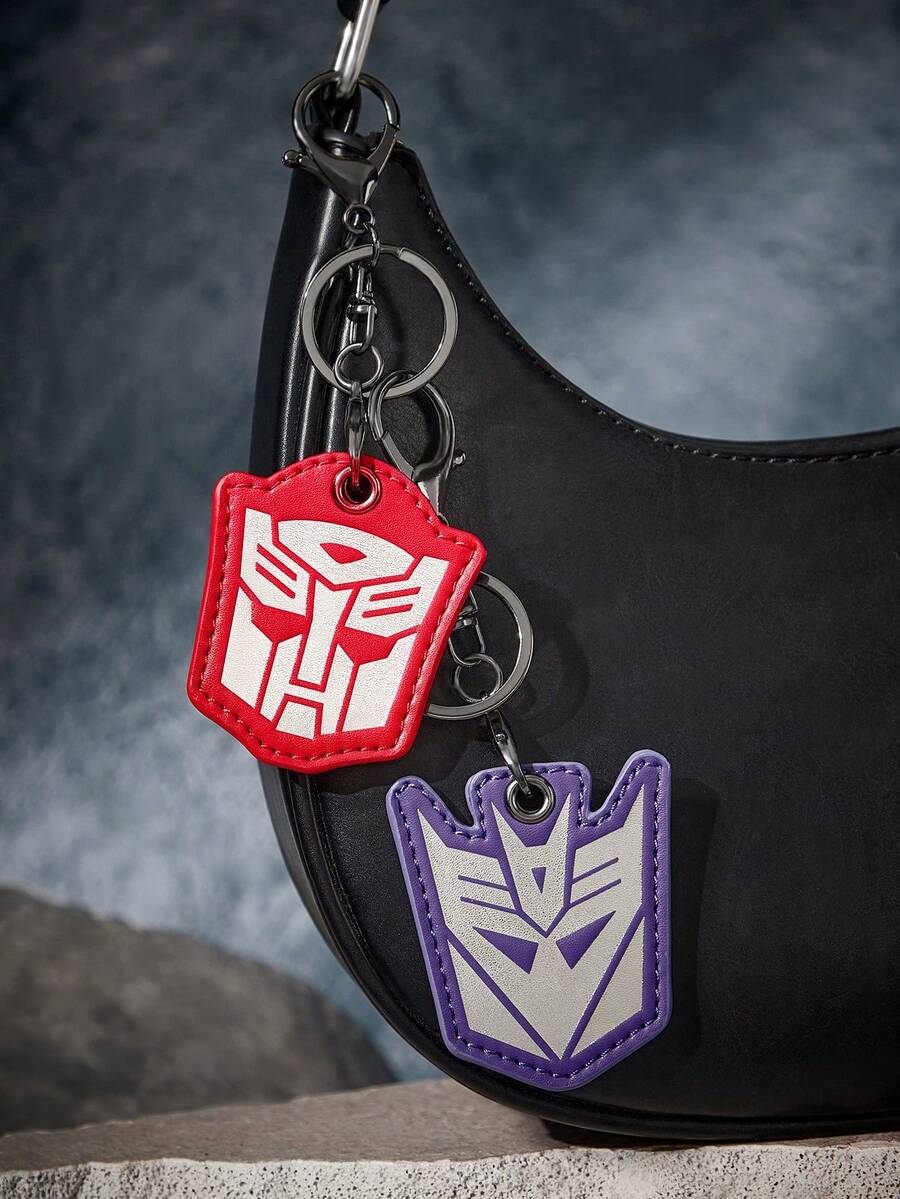 Transformers X SHEIN Bộ 1/2 móc khóa da PU có chức năng lưu trữ, tương thích với Apple AirTag, vỏ bảo vệ AirTag, vỏ bảo vệ thiết bị theo dõi GPS, phù hợp cho nam, nữ, học sinh, logo Autobot, ý tưởng quà tặng. - Nhiều màu - Xem 1