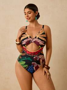 Travachic Traje de baño de una pieza sexy y delgado con estampado de plantas tropicales, con detalle de giro en la parte delantera y hueco, para mujeres de talla grande, para playa y vacaciones casuales - Multicolor - Ver 1