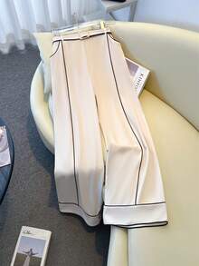 GlowEve CURVE Pantaloni eleganti e casual da donna, a gamba ampia, con tasche inclinate, dettagli a contrasto e fibbia metallica - Albicocca - Visualizzare 1