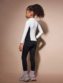 SHEIN Ensemble 2 pièces noir et blanc pour jeunes filles, Top à manches longues et pantalon de gym d'automne, tenue de sport en tissu haute élasticité pour le jeu et le mouvement - Multicolore - Voir 2