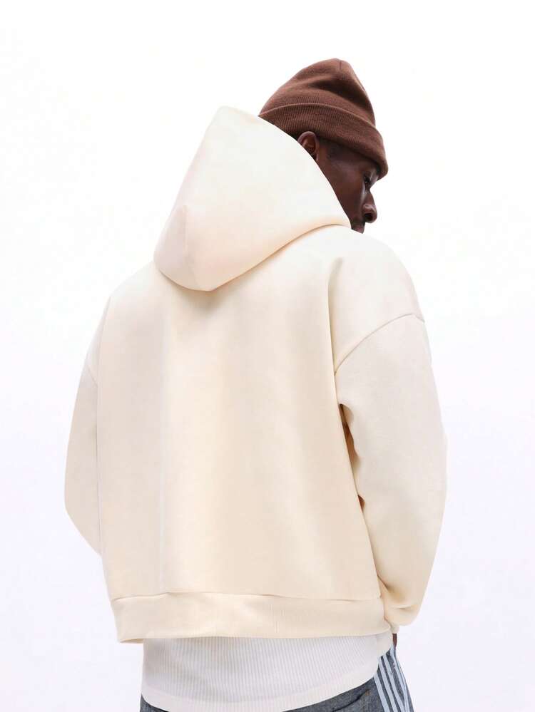 Sudadera con cremallera y corte ajustado bordada